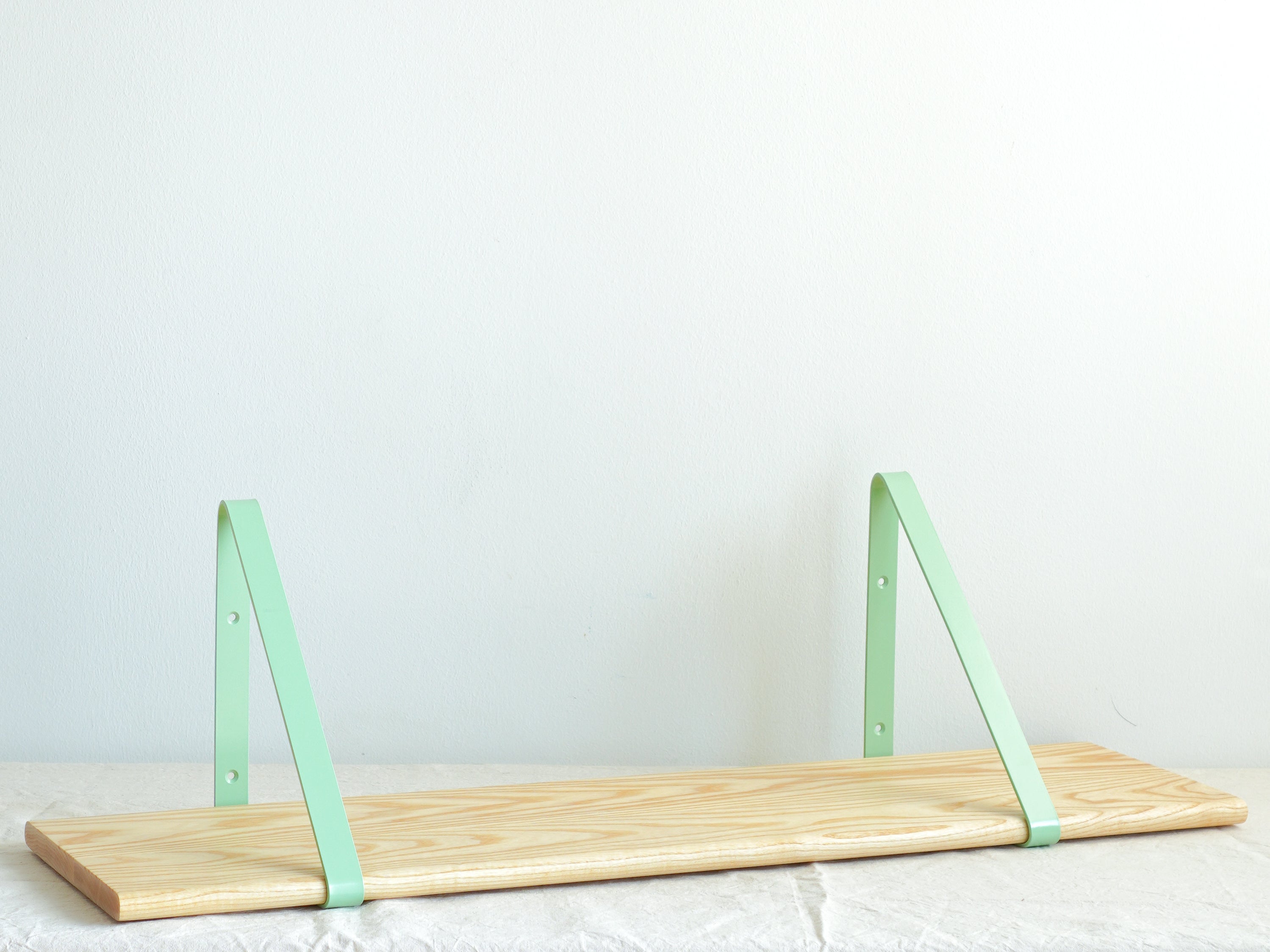 Light Brown Shelf with Mint Green Brackets