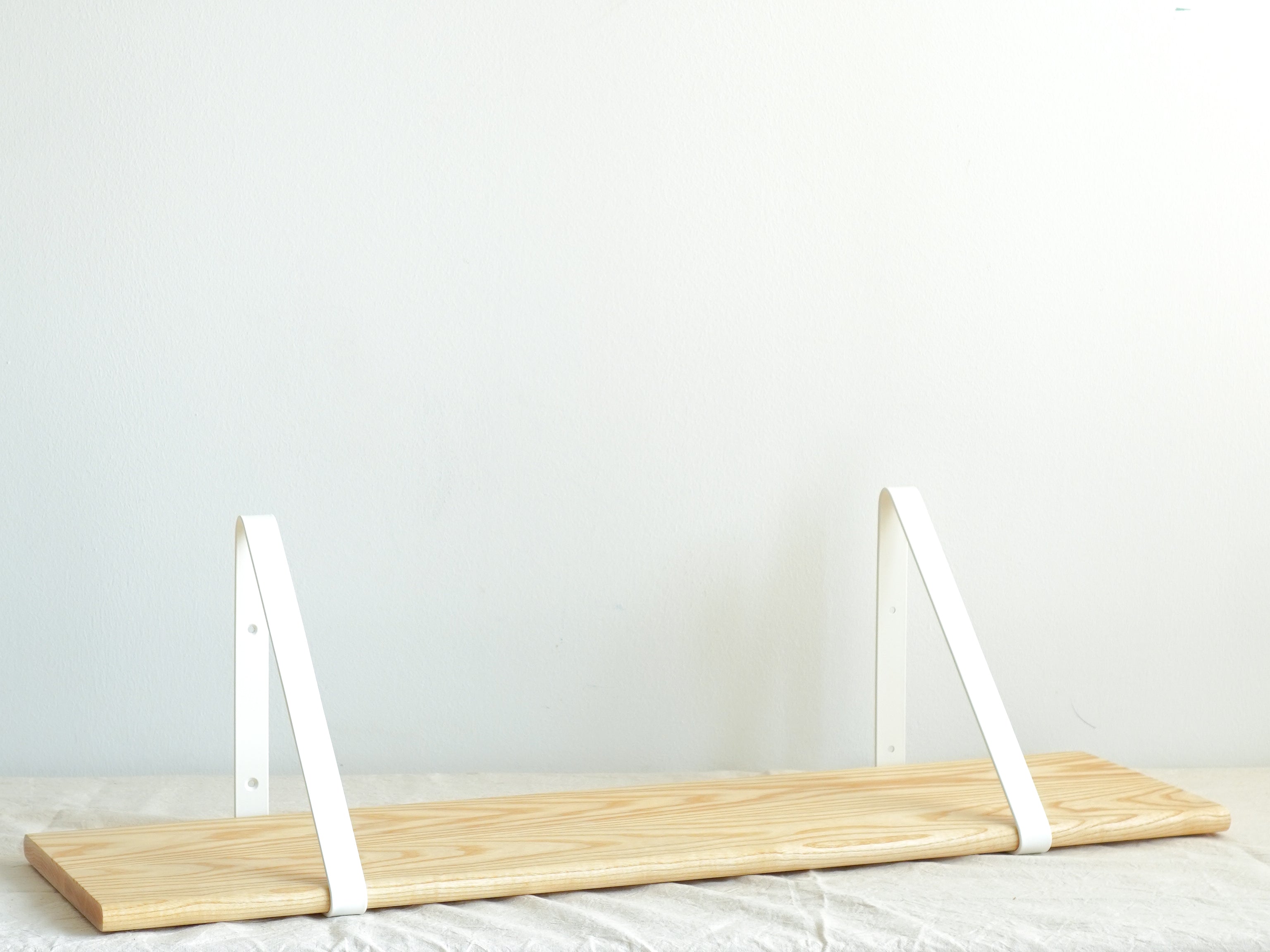 Light Brown Shelf with White Brackets