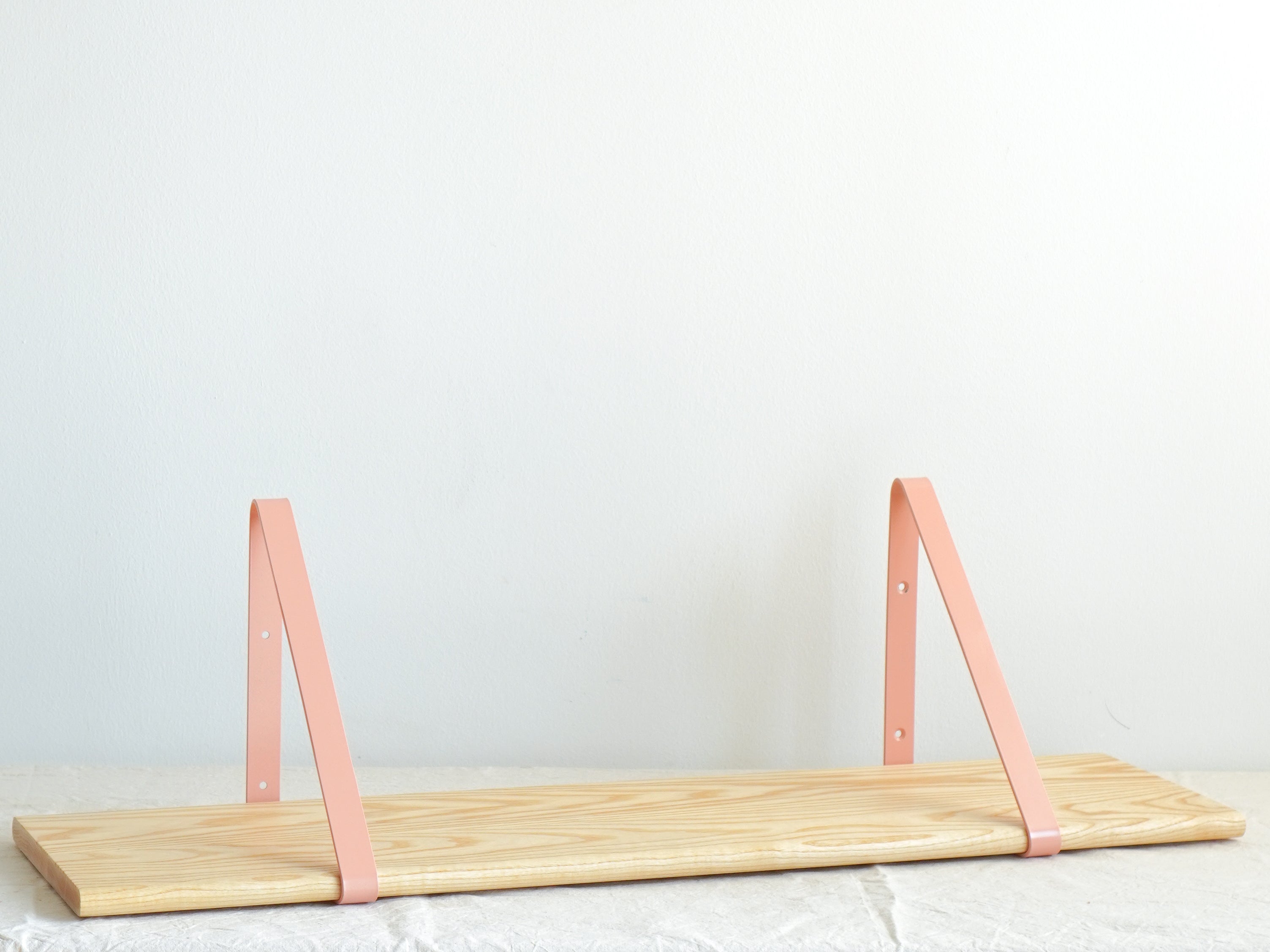 Light Brown Shelf with Light Pink Brackets