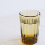 Brut Homeware Reed Water Glass in Amber, made from recycled glass