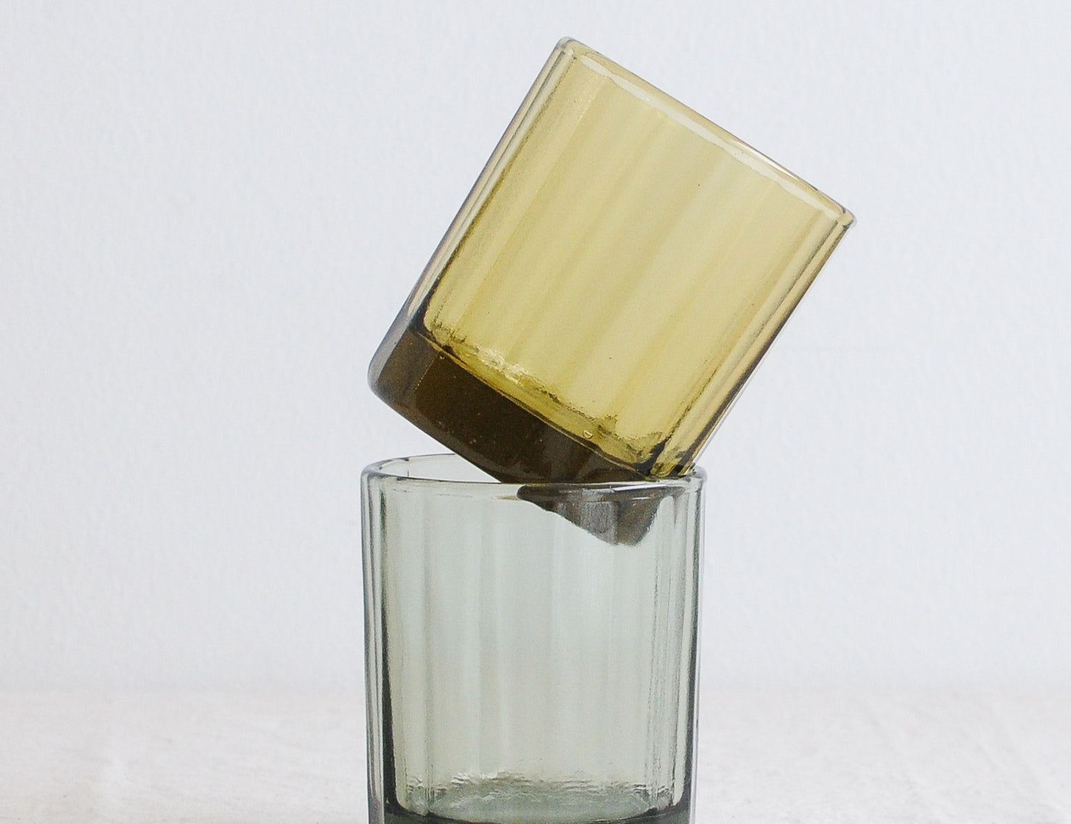 Brut Homeware Reed Tumbler in Amber and Smokey Green, made from recycled glass