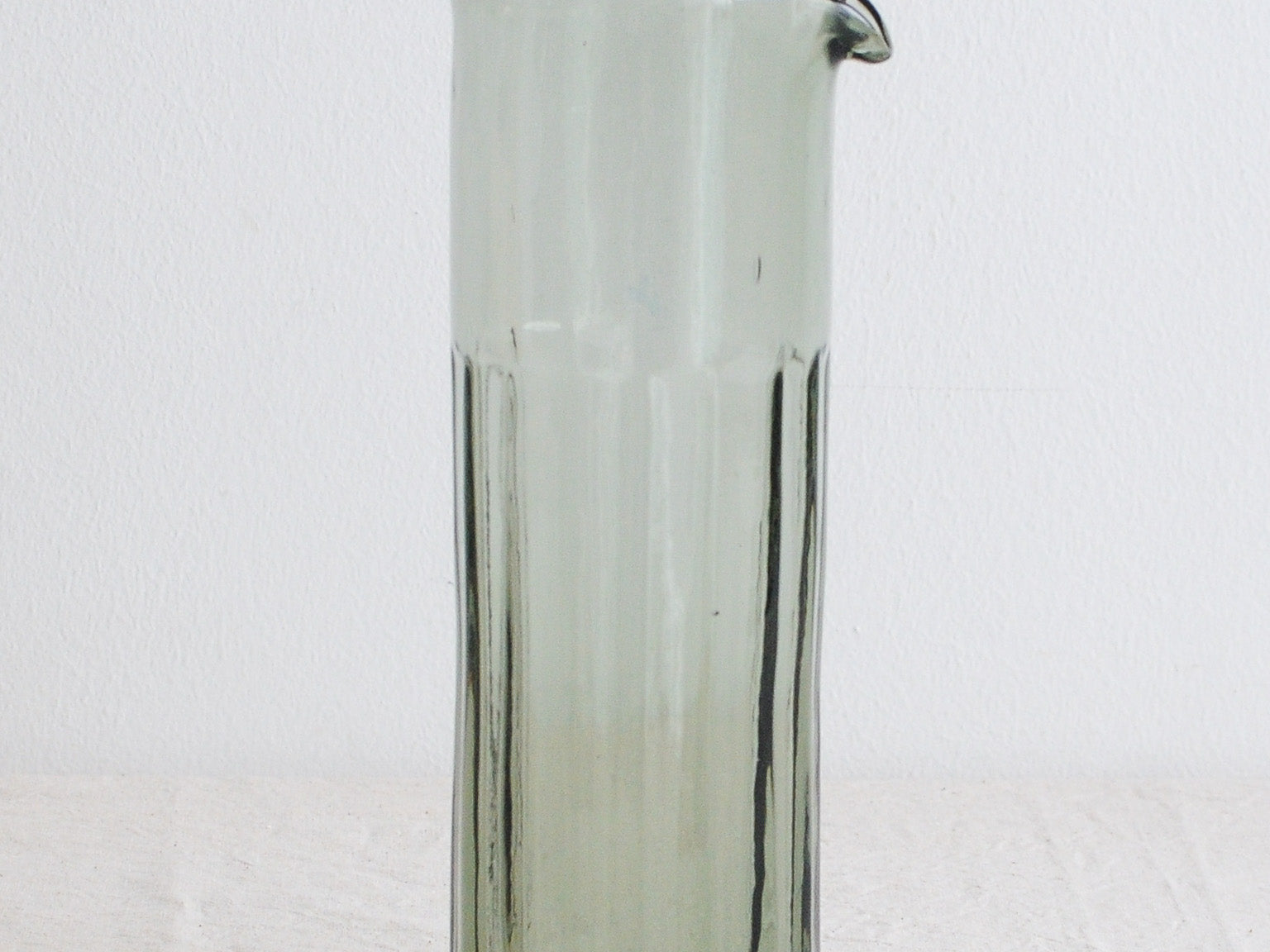 Brut Homeware Reed Carafe in Smokey Green, made from recycled glass