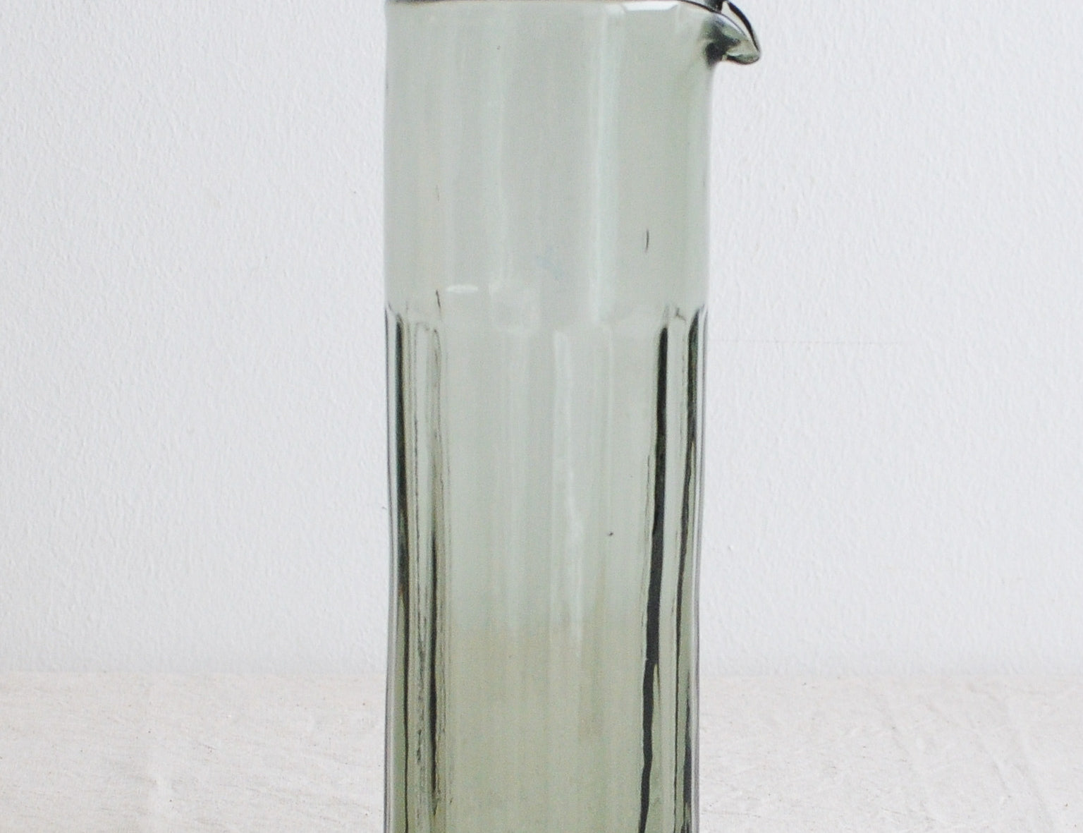 Brut Homeware Reed Carafe in Smokey Green, made from recycled glass